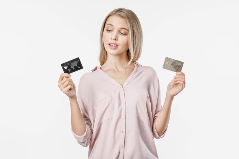 woman-in-debt-holding-at-multiple-credit-cards-iso-2025-01-09-05-31-27-utc.jpg